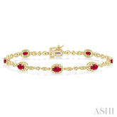 5x3 MM Oval Cut Ruby and 1/20 Ctw Round Cut Diamond Bracelet in 10K Yellow Gold