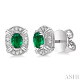 5x3 MM Oval Cut Emerald and 1/10 Ctw Single Cut Diamond Earrings in 14K White Gold