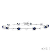 4x3 MM Oval Cut Sapphire and 1/3 Ctw Round Cut Diamond Precious Bar Bracelet in 10K White Gold