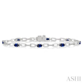 5x3 MM Oval Cut Sapphire and 1/6 Ctw Round Cut Diamond Precious Bracelet in 10K White Gold