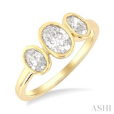 1 Ctw 3-Stone Bezel Set Oval Cut Diamond Ring in 14K Yellow Gold