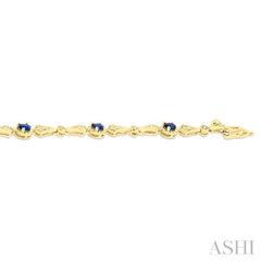 4X3 MM Oval Cut Sapphire 1/10 ctw and Round Cut Diamond Precious Bracelet in 10K Yellow Gold