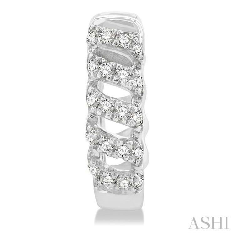 1/4 ctw Petite Open Swirl Round Cut Diamond Fashion Huggies in 10K White Gold