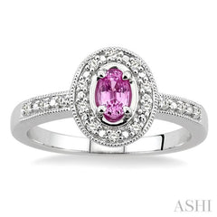5x3 MM oval cut Pink Sapphire and 1/10 ctw Single Cut Diamond Ring in 14K White Gold.