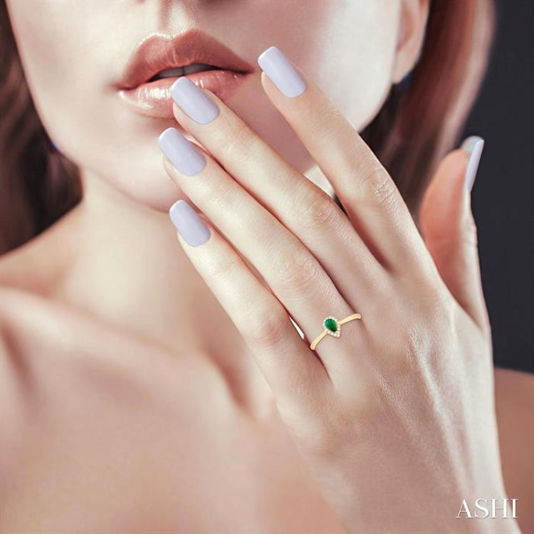 5x3 MM Pear Shape Emerald and 1/20 Ctw Round Cut Diamond Halo Precious Ring in 10K Yellow Gold