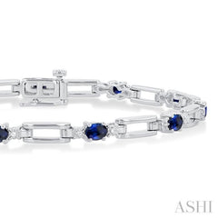 4X3 MM Oval Cut Sapphire and 1/10 Ctw Round Cut Diamond Paperclip Bracelet in 14K White Gold