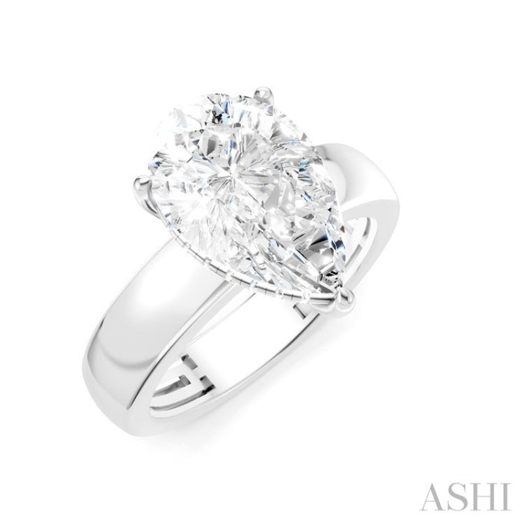 1/8 Ctw Pear Shape Round Cut Diamond Semi-Mount Engagement Ring in 14K White Gold