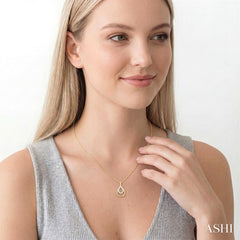 1/10 Ctw Overlay Pear Shaped Frame Round Cut Golden Glow Diamond Fashion Drop Petite Pendant With Chain in 10K Yellow Gold