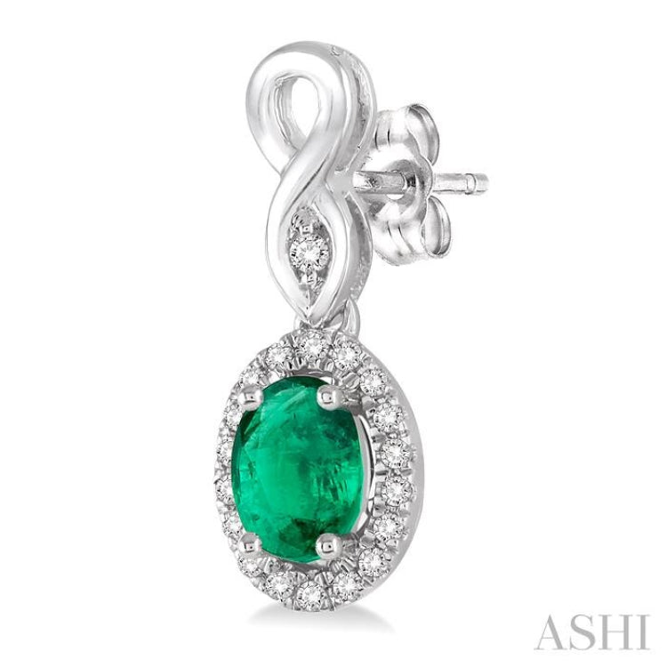 5x3 MM Oval Cut Emerald and 1/6 ctw Round Cut Diamond Earrings in 10K White Gold