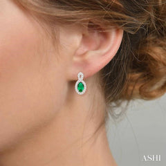 5x3 MM Oval Cut Emerald and 1/5 ctw Round Cut Diamond Earrings in 10K White Gold