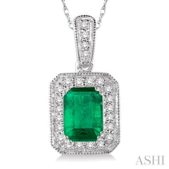 6x4 MM Emerald Shape Emerald and 1/5 Ctw Round Cut Diamond Pendant in 14K White Gold with Chain