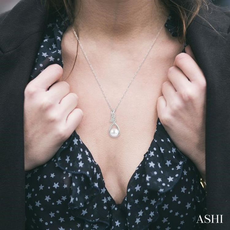 7 MM Round Shape Cultured Pearl and 1/10 Ctw Swirl Top Round Cut Diamond Fashion Pendant With Chain in 10K White Gold
