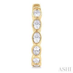 1 1/10 Ctw Bezel Set Oval Cut Diamond Fashion Hoop Earring in 14K Yellow Gold