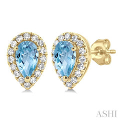 5x3 MM Pear Shape Aquamarine and 1/8 ctw Single Cut Diamond Halo Semi Precious Stud Earrings in 10K Yellow Gold