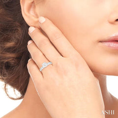 1/20 ctw Circular Shape Grooved Shank Round Cut Diamond Semi Mount Engagement Ring in 14K White Gold